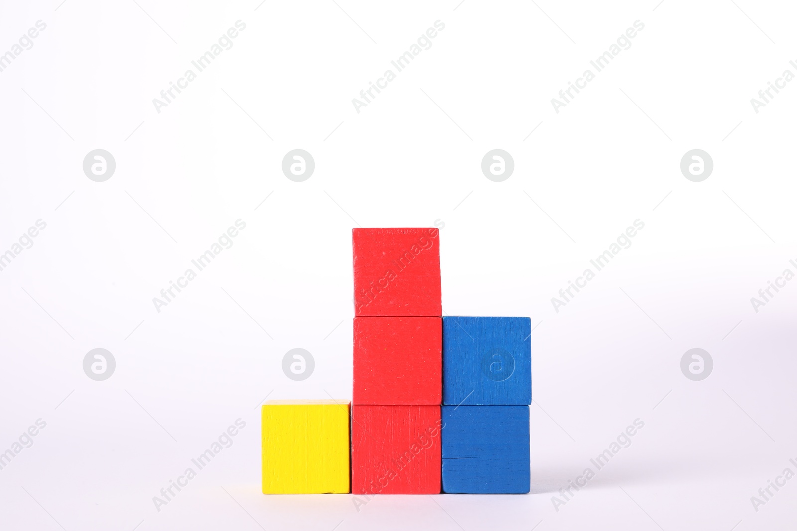 Photo of Many colorful wooden cubes isolated on white