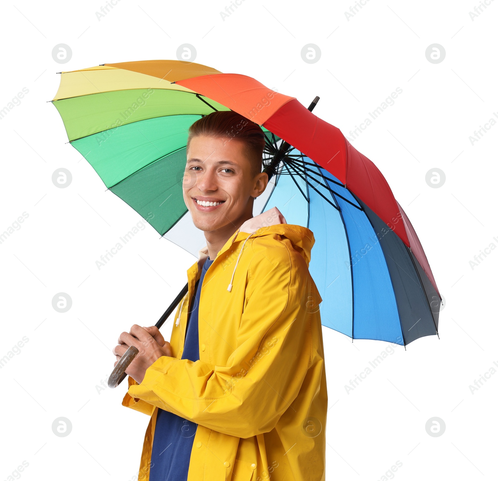 Photo of Young man with rainbow umbrella on white background