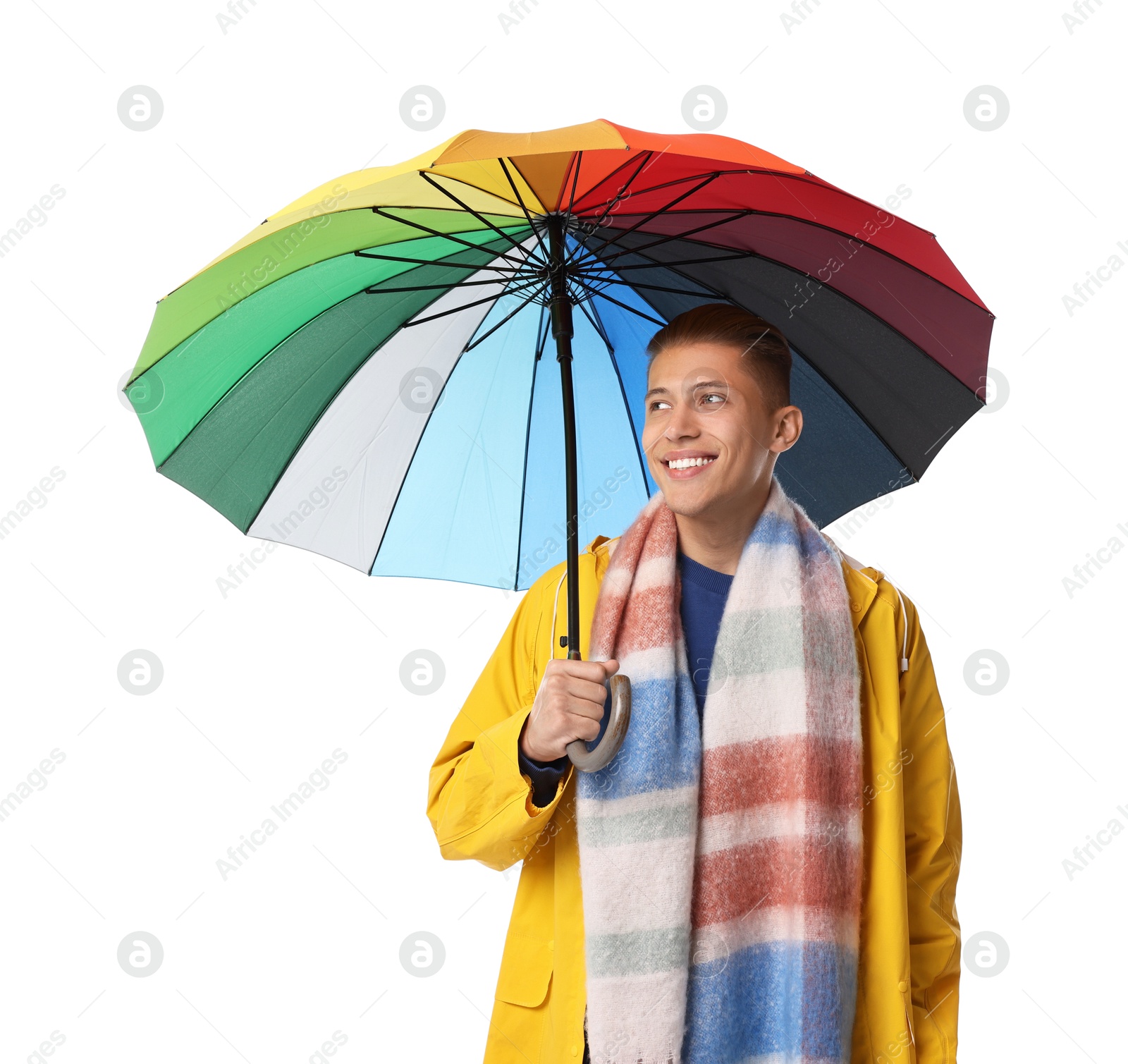 Photo of Young man with rainbow umbrella on white background