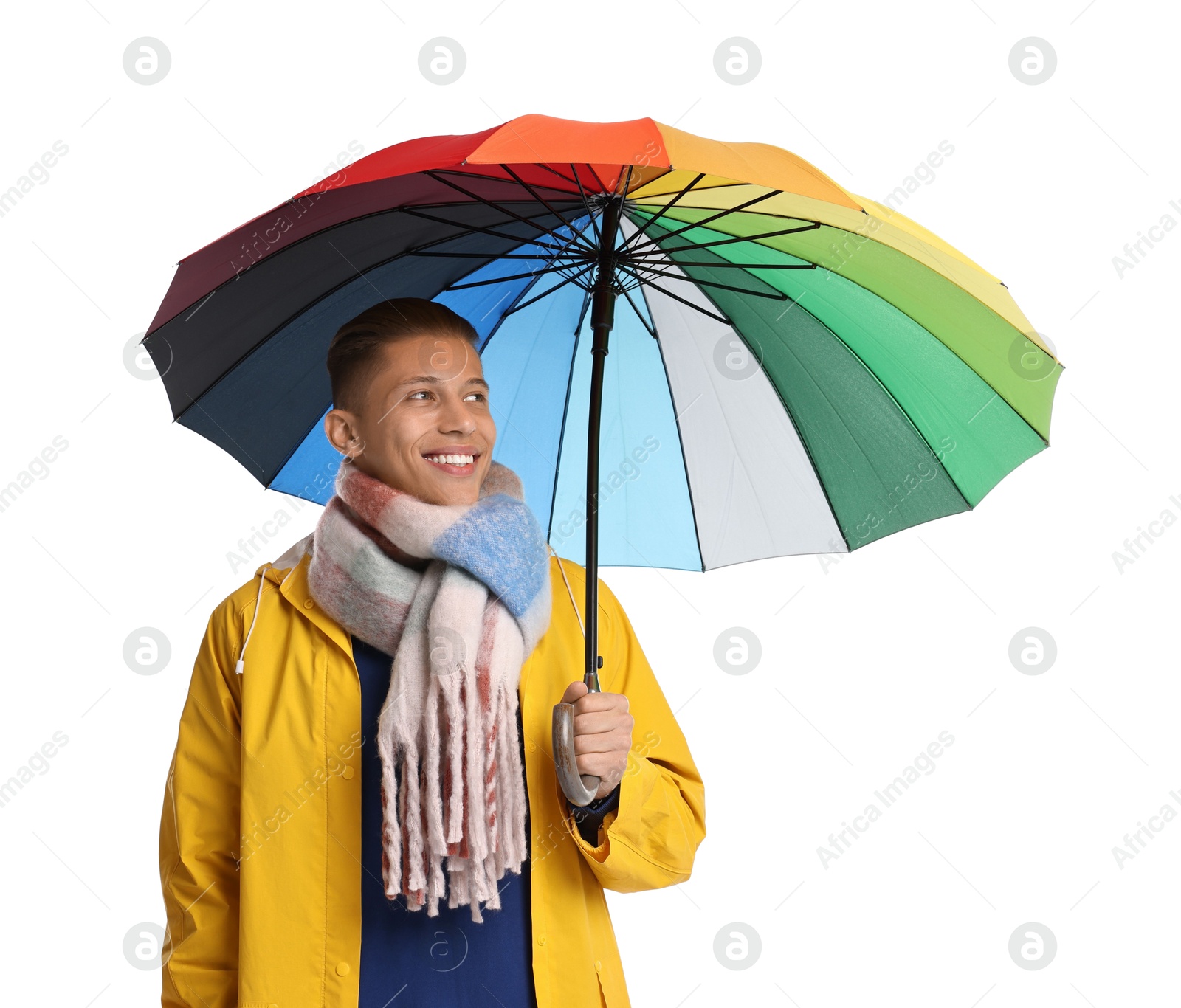 Photo of Young man with rainbow umbrella on white background