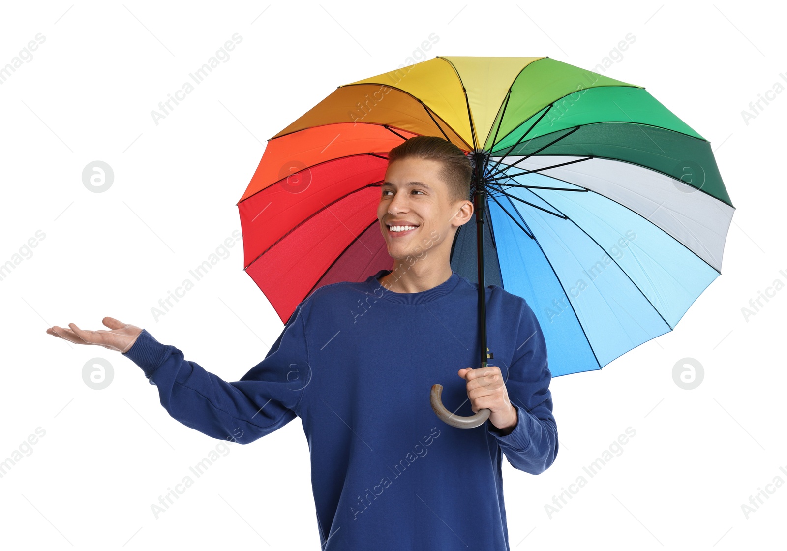 Photo of Young man with rainbow umbrella on white background