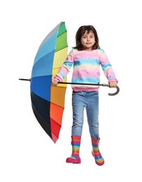 Cute little girl with colorful umbrella on white background