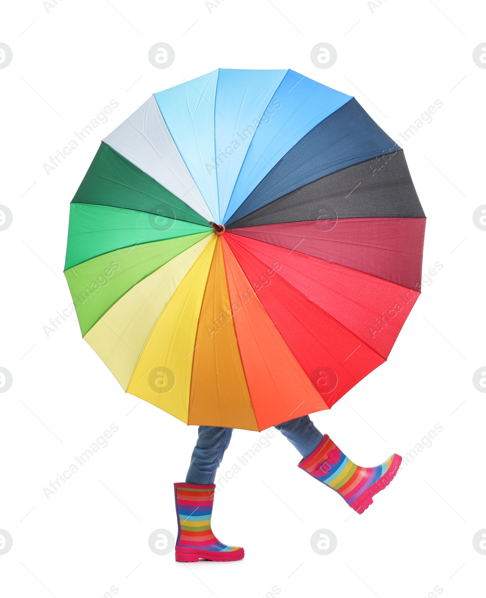 Photo of Little girl with colorful umbrella on white background