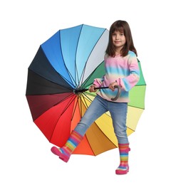 Photo of Cute little girl with colorful umbrella on white background