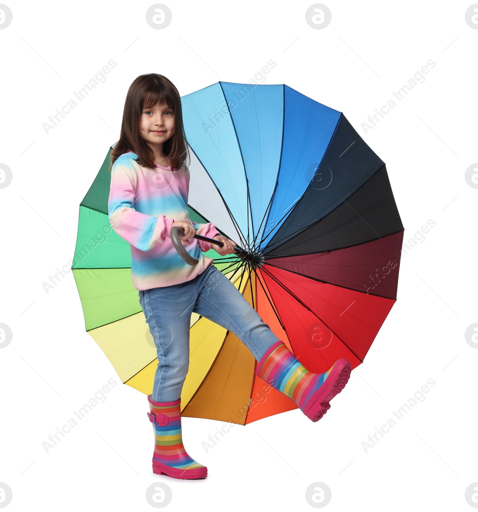 Photo of Cute little girl with colorful umbrella on white background