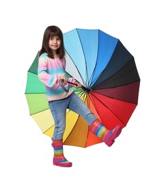 Cute little girl with colorful umbrella on white background