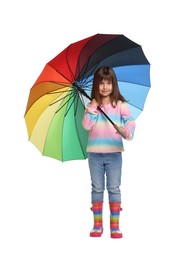 Photo of Cute little girl with colorful umbrella on white background