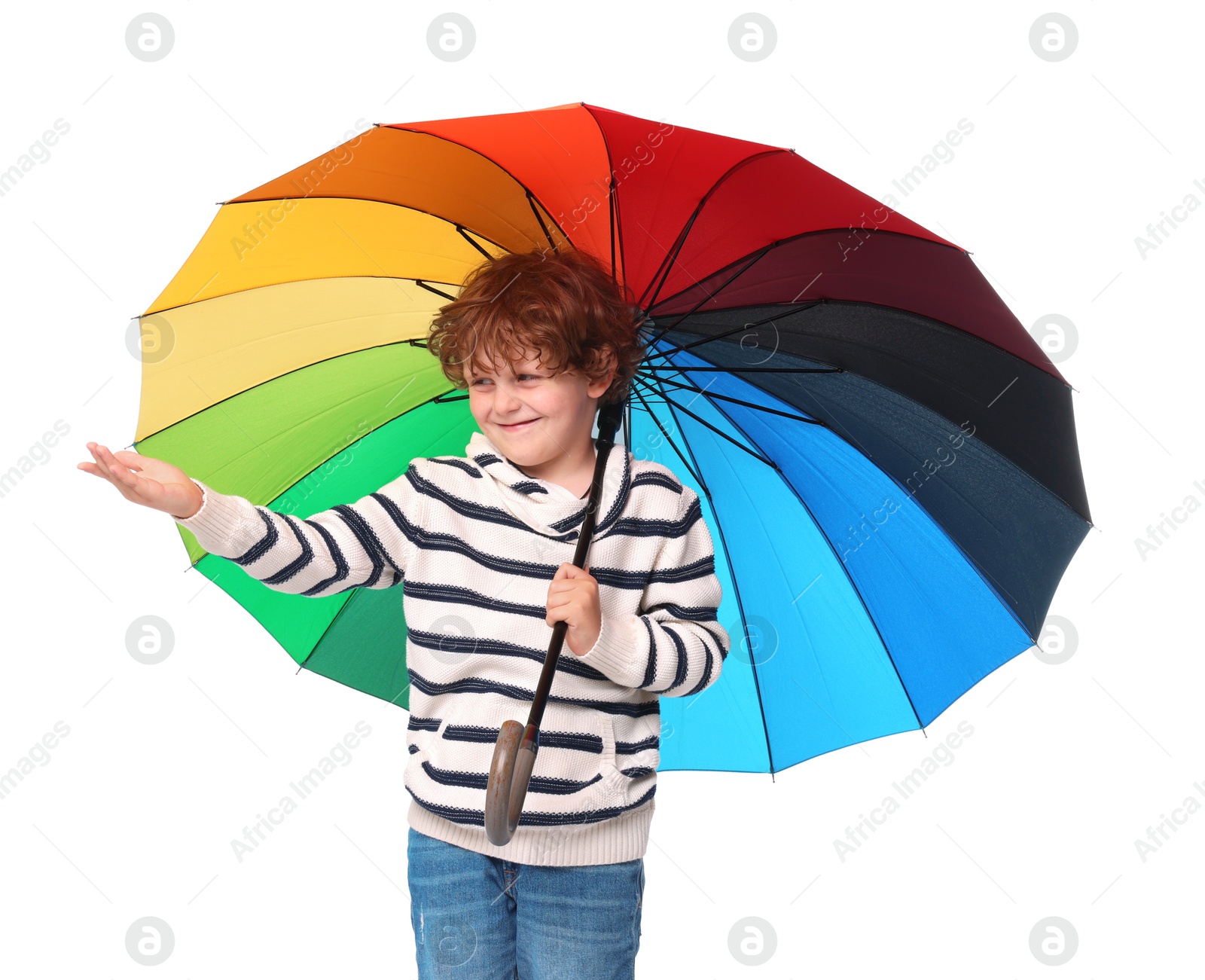 Photo of Little boy with rainbow umbrella on white background