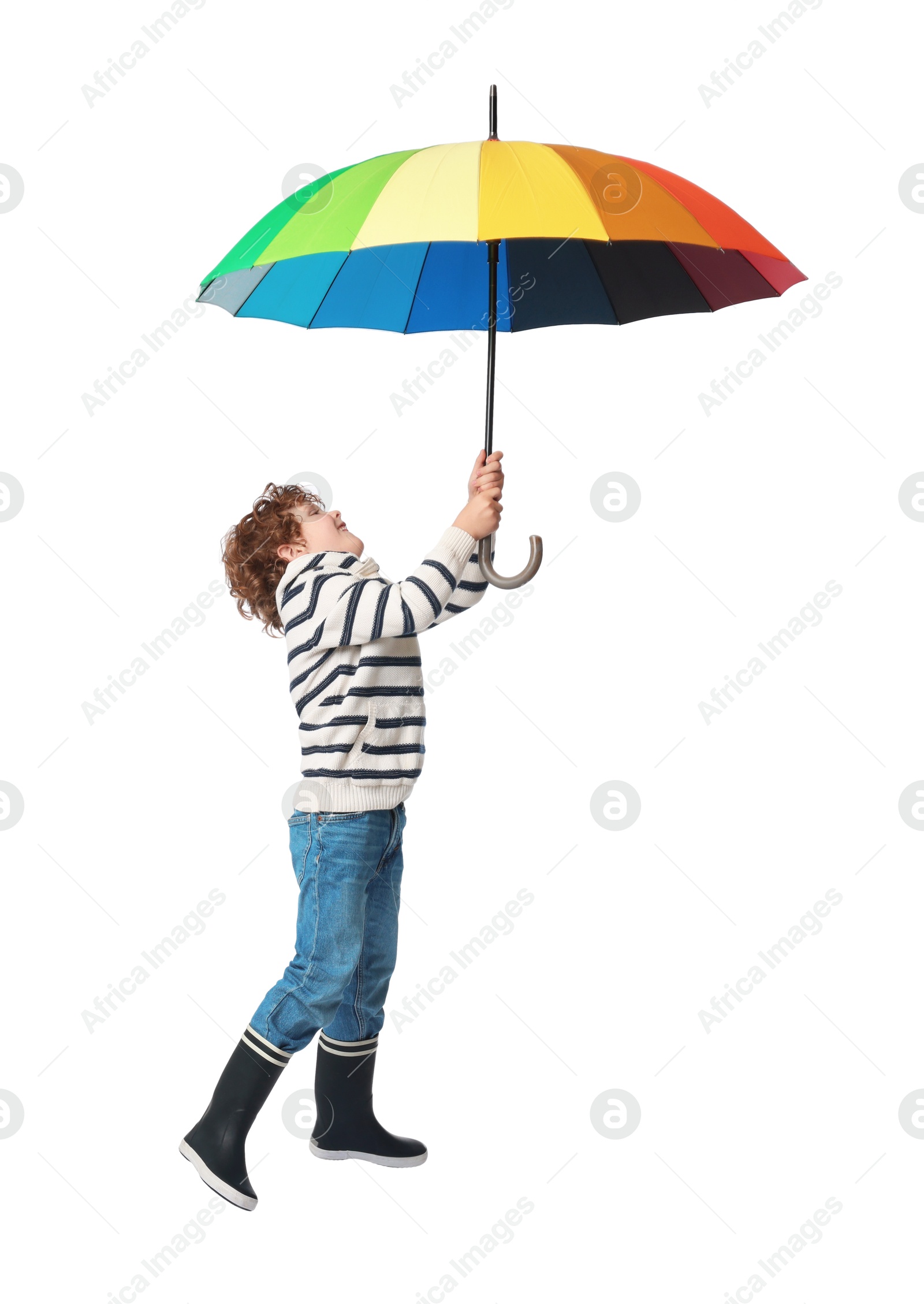 Photo of Little boy with rainbow umbrella on white background