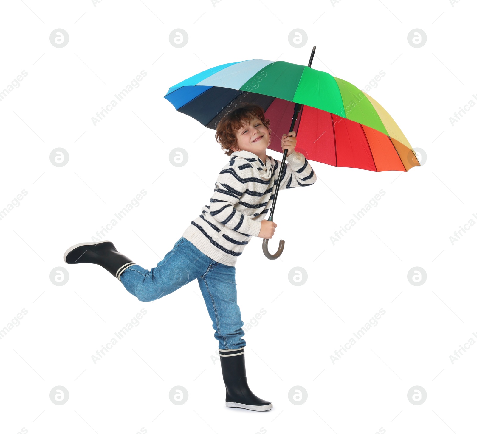 Photo of Little boy with rainbow umbrella on white background