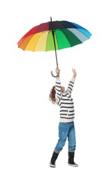 Photo of Little boy with rainbow umbrella on white background