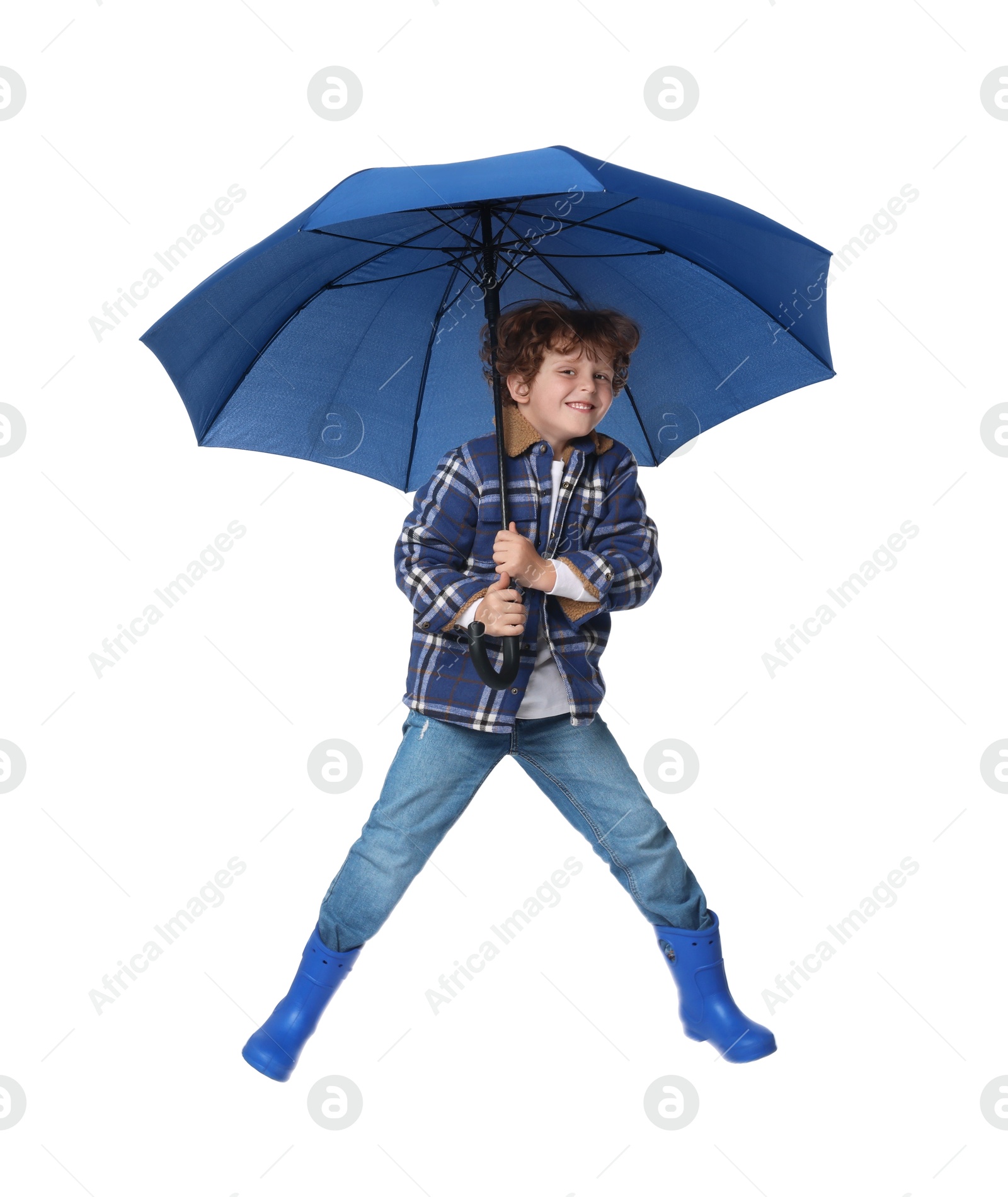 Photo of Little boy with blue umbrella on white background