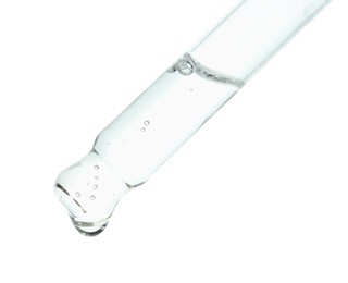 Pipette with cosmetic serum on white background, closeup