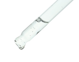 Pipette with cosmetic serum on white background, closeup