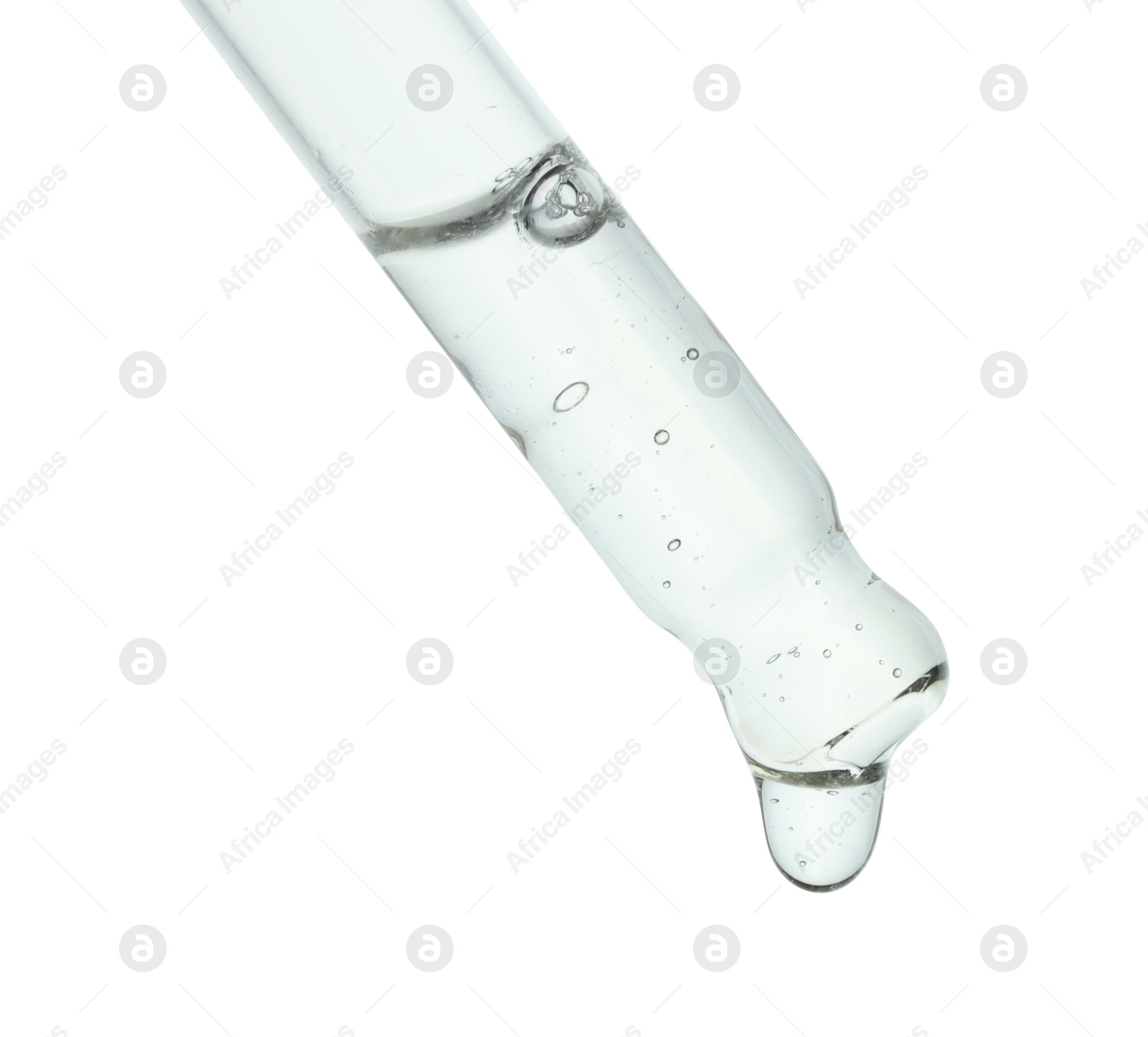 Photo of Dripping cosmetic serum from pipette on white background, closeup