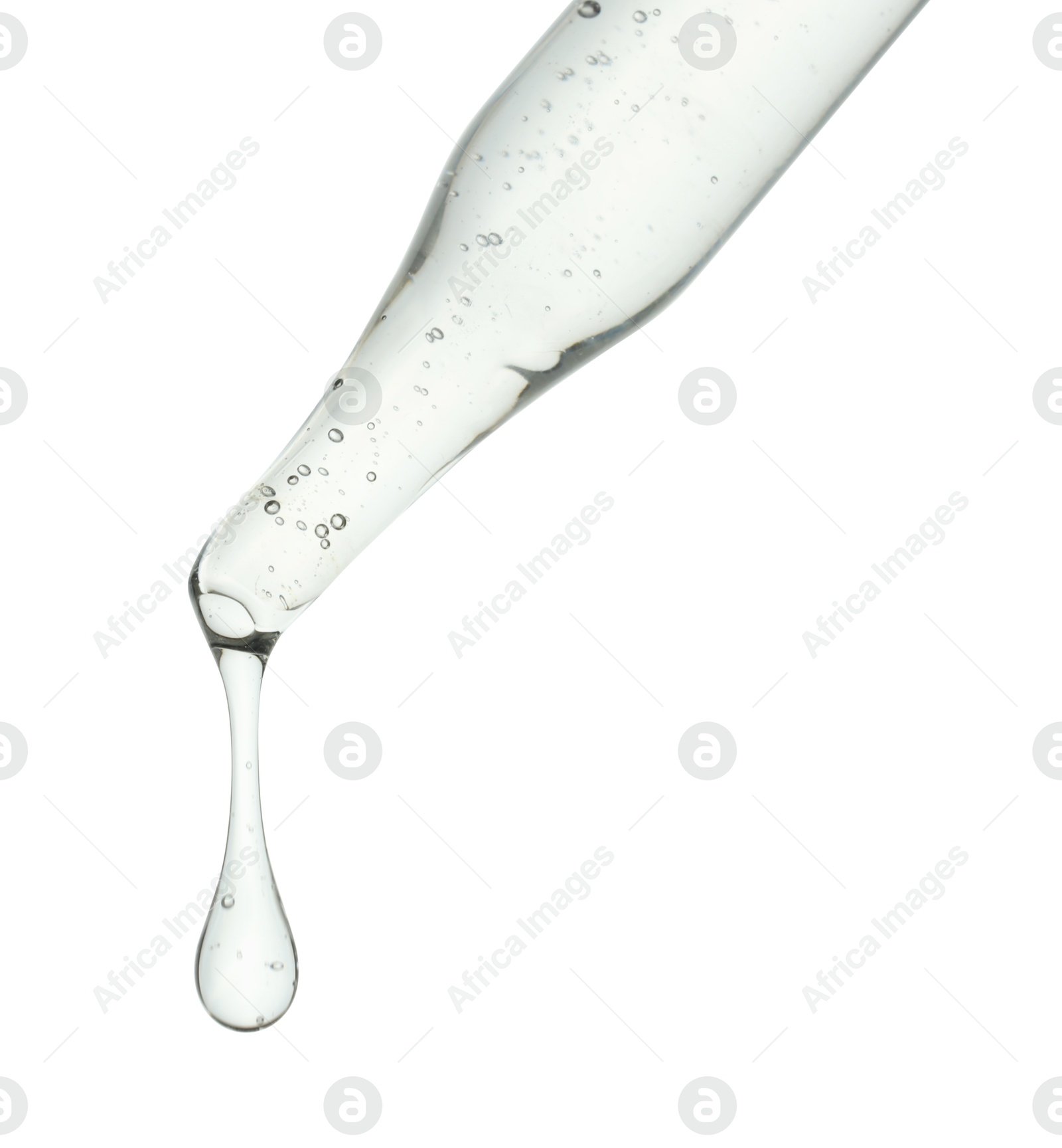 Photo of Dripping cosmetic serum from pipette on white background, closeup