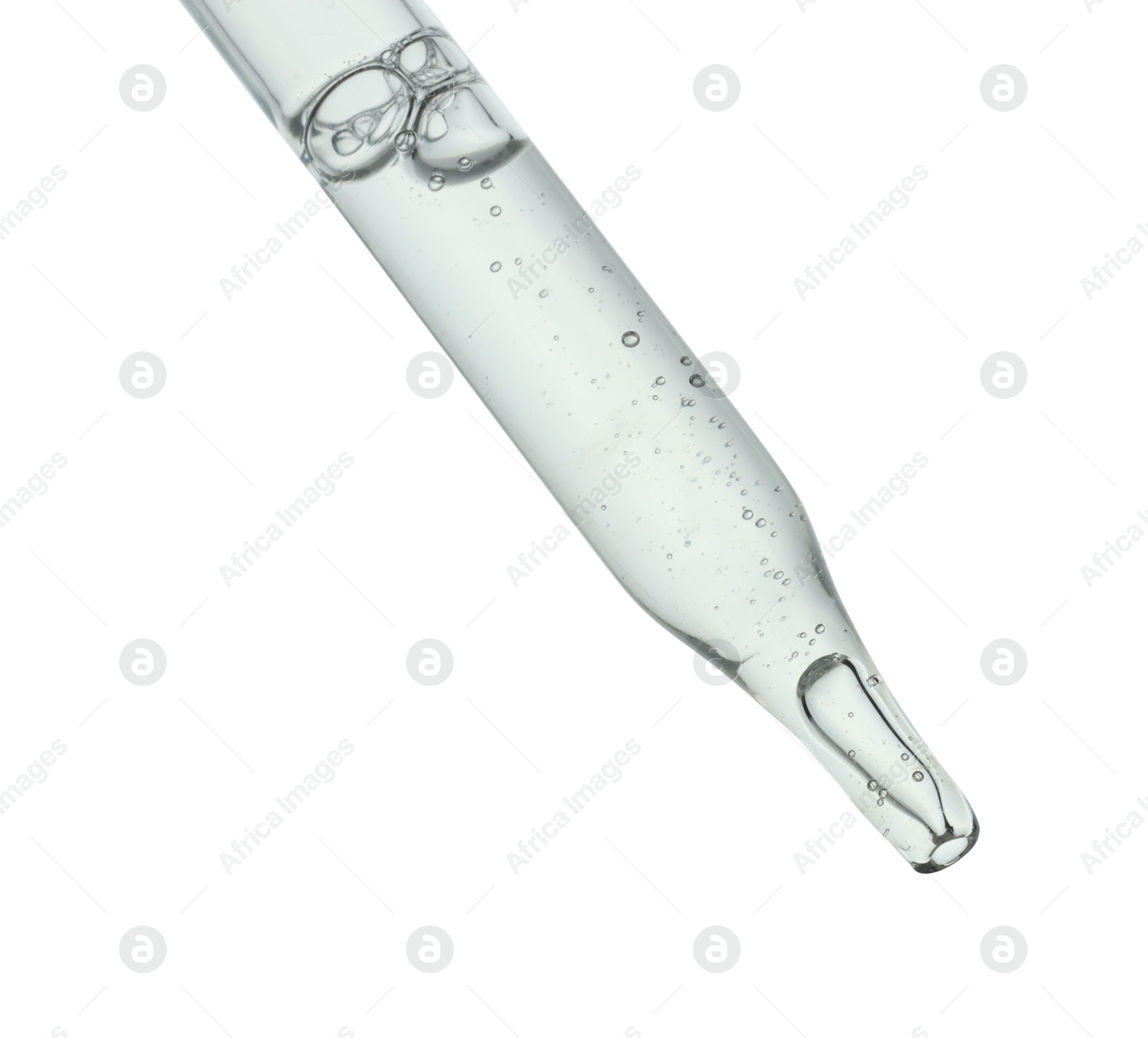 Photo of Dripping cosmetic serum from pipette on white background, closeup