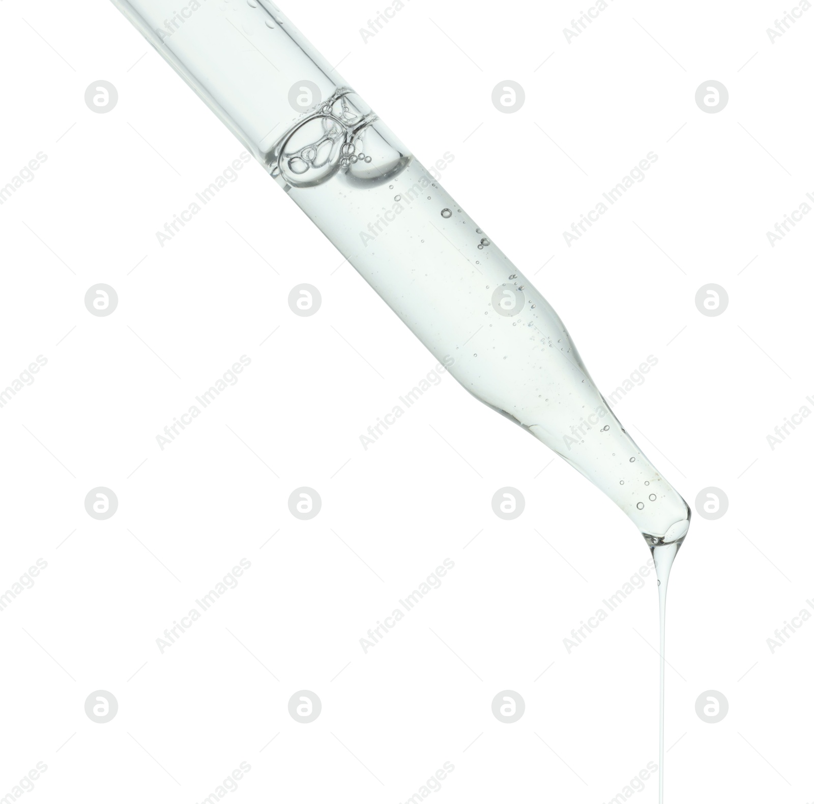 Photo of Dripping cosmetic serum from pipette on white background, closeup