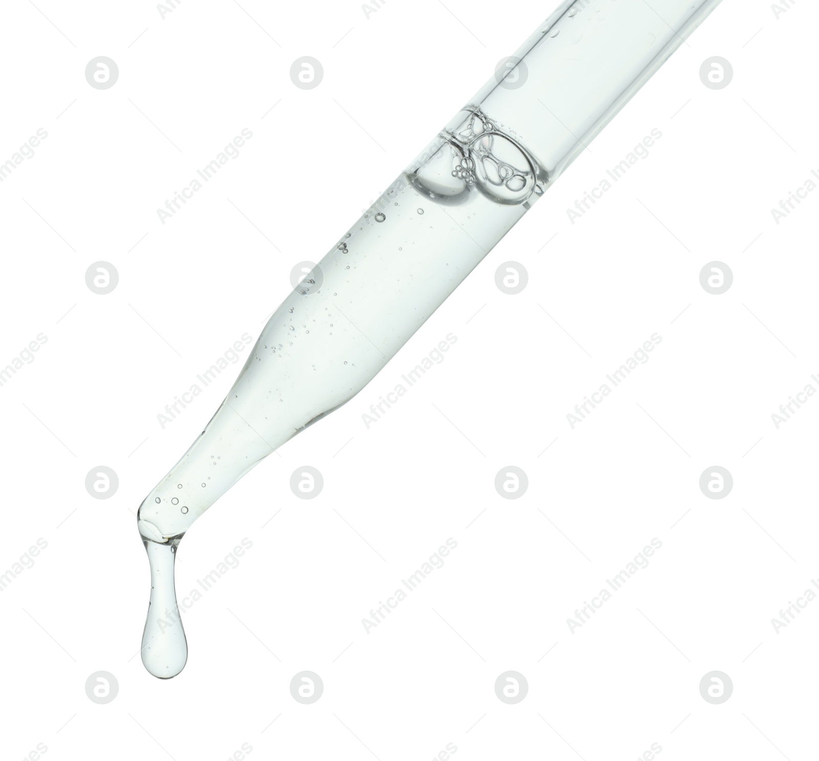 Photo of Dripping cosmetic serum from pipette on white background, closeup