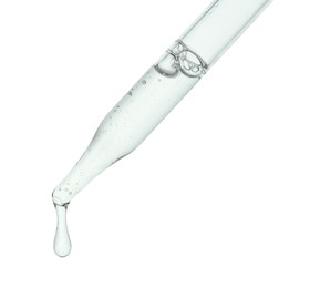 Photo of Dripping cosmetic serum from pipette on white background, closeup