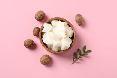 Natural shea butter and nuts on pink background, flat lay