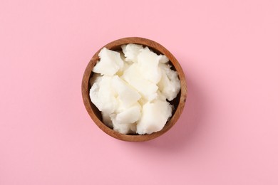 Photo of Natural shea butter on pink background, top view