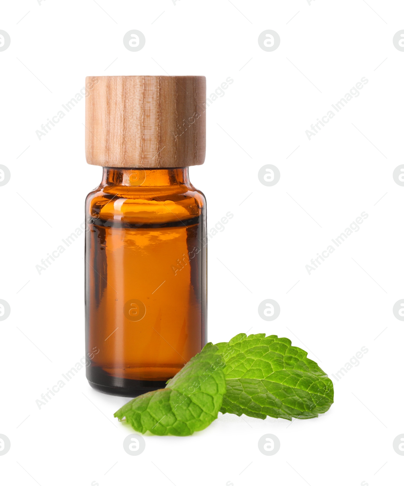 Photo of Bottle of essential oil and mint isolated on white