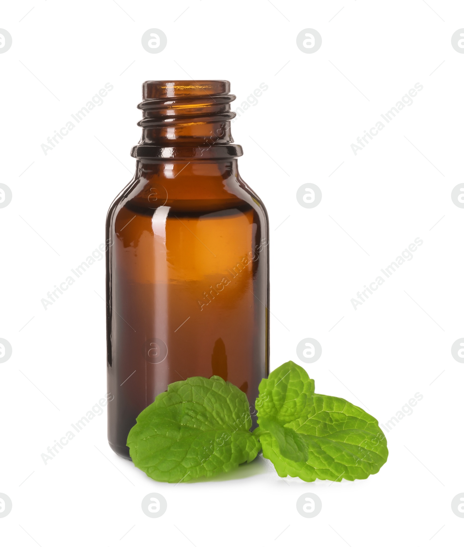 Photo of Bottle of essential oil and mint isolated on white