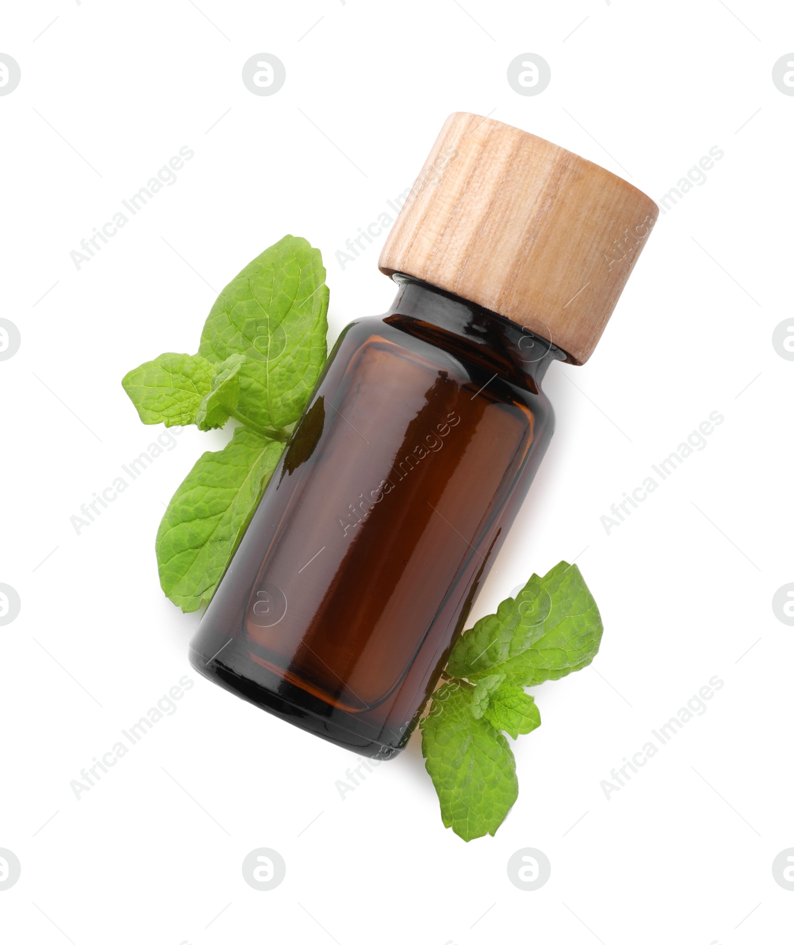 Photo of Bottle of essential oil and mint isolated on white, top view