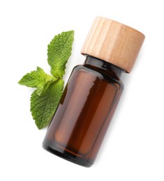 Bottle of essential oil and mint isolated on white, top view