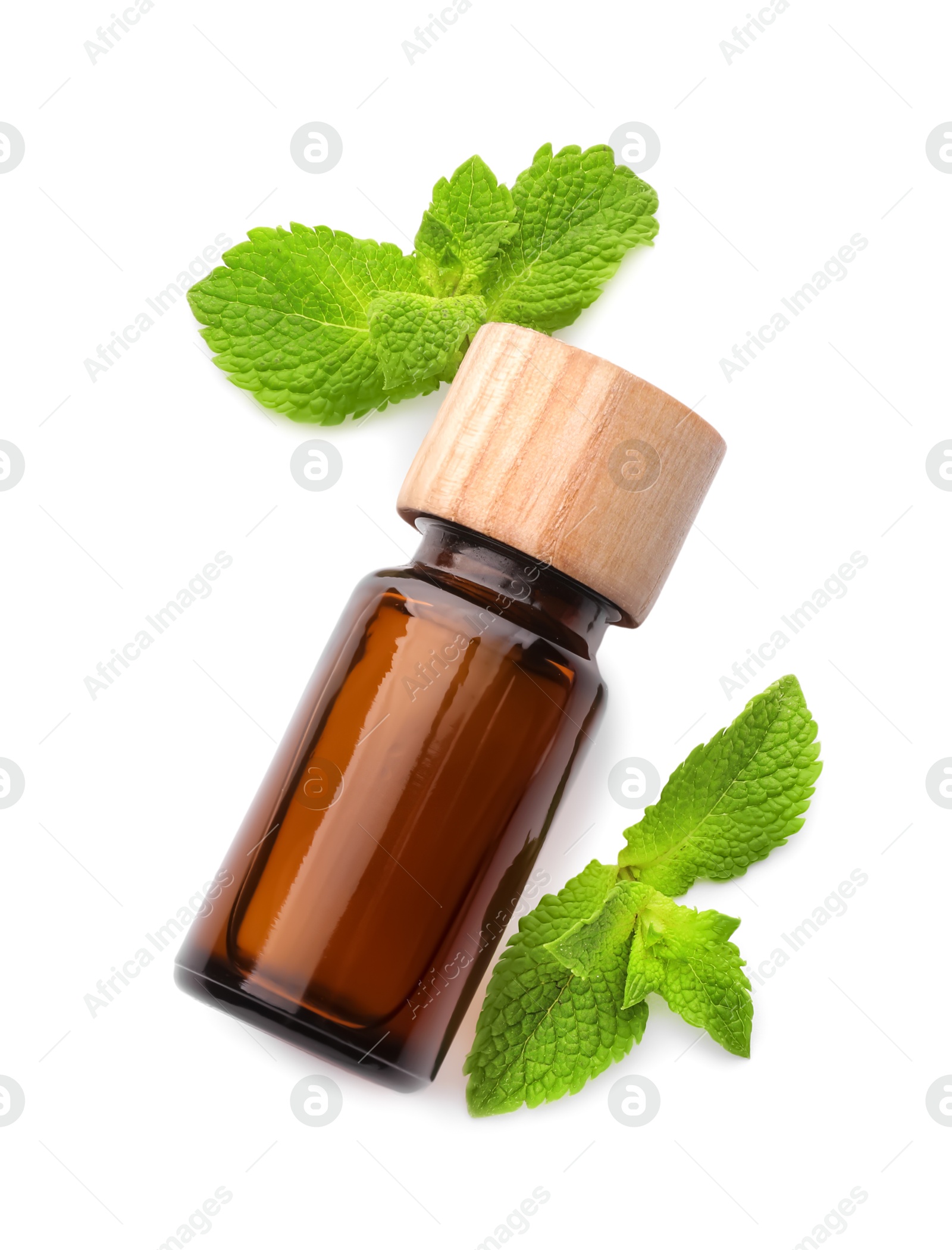 Photo of Bottle of essential oil and mint isolated on white, top view