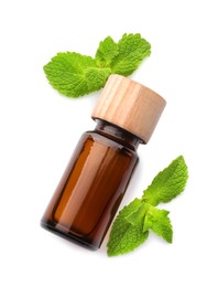 Photo of Bottle of essential oil and mint isolated on white, top view