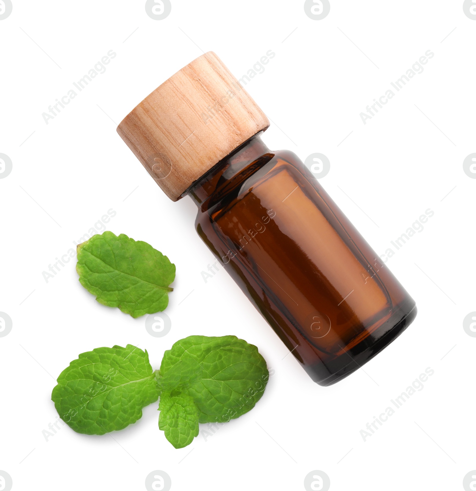 Photo of Bottle of essential oil and mint isolated on white, top view