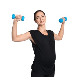 Beautiful pregnant woman with dumbbells doing exercises on white background