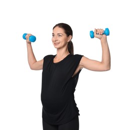 Beautiful pregnant woman with dumbbells doing exercises on white background