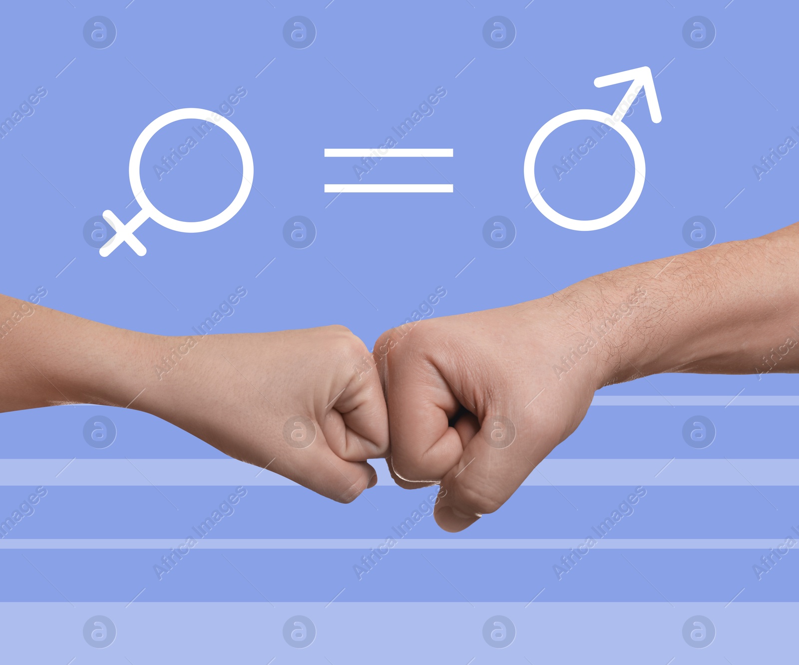 Image of Gender equality concept. Man and woman making fist bump on light blue background