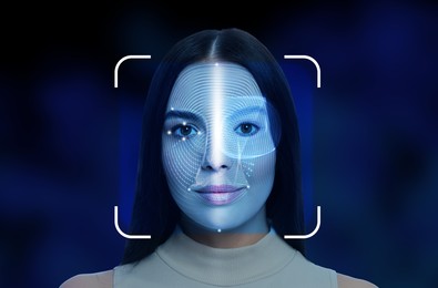 Facial recognition system. Scanning woman's face for authentication