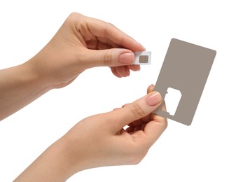 Photo of Woman removing SIM card from holder on white background, closeup