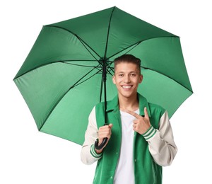 Young man with green umbrella pointing on white background