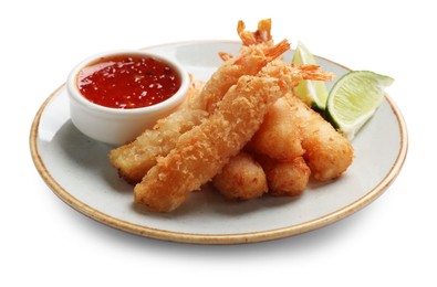 Delicious breaded fried shrimps with sauce isolated on white