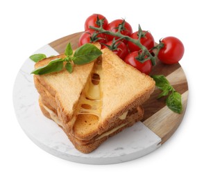 Photo of Pieces of toasted bread with melted cheese, tomatoes and basil isolated on white