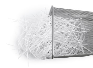 Metal basket and shredded paper isolated on white, top view