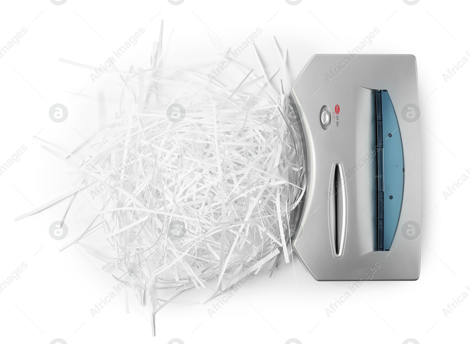 Photo of Shredder and paper strips isolated on white, top view