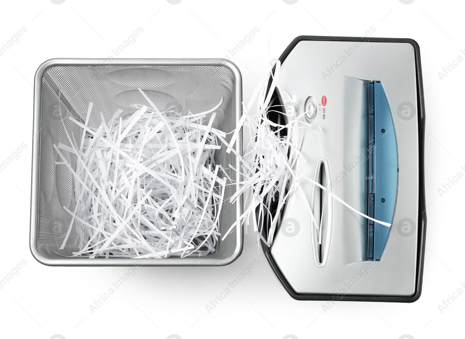 Photo of Shredder, metal basket and paper strips isolated on white, top view