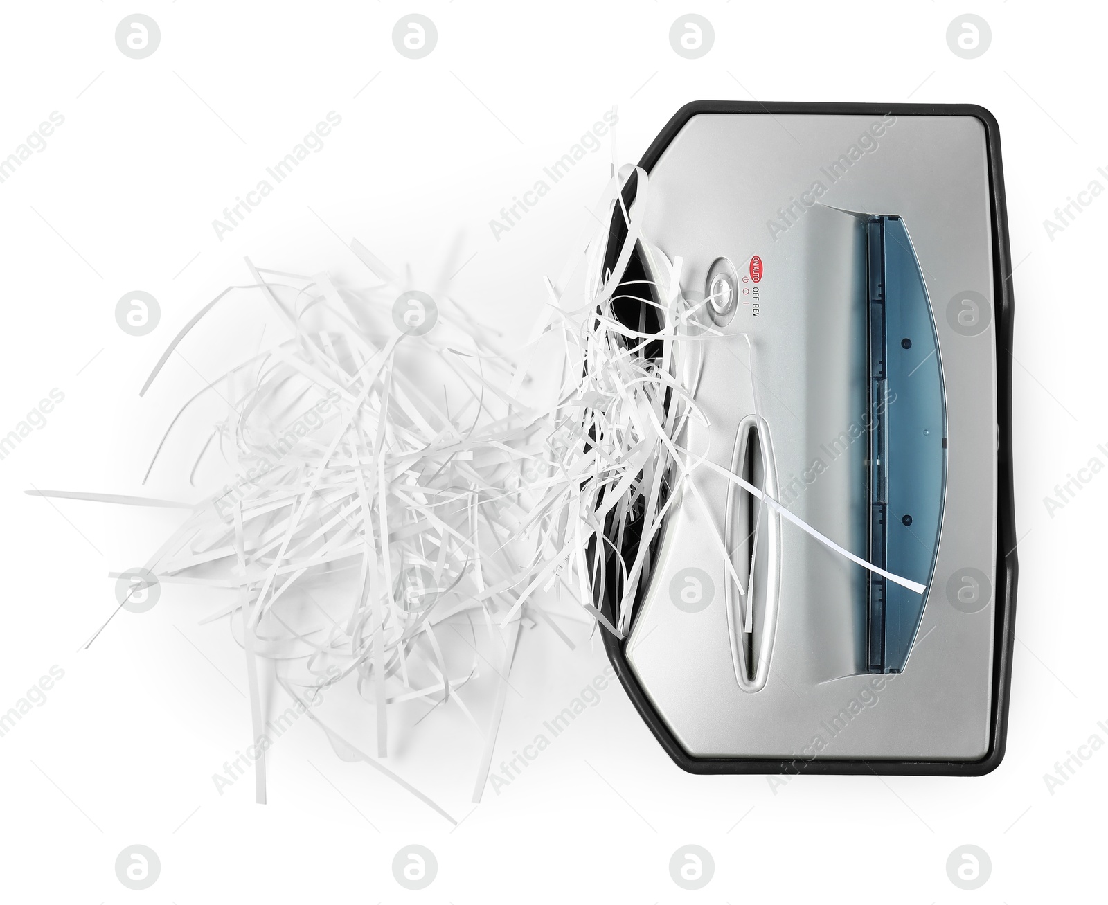 Photo of Shredder and paper strips isolated on white, top view