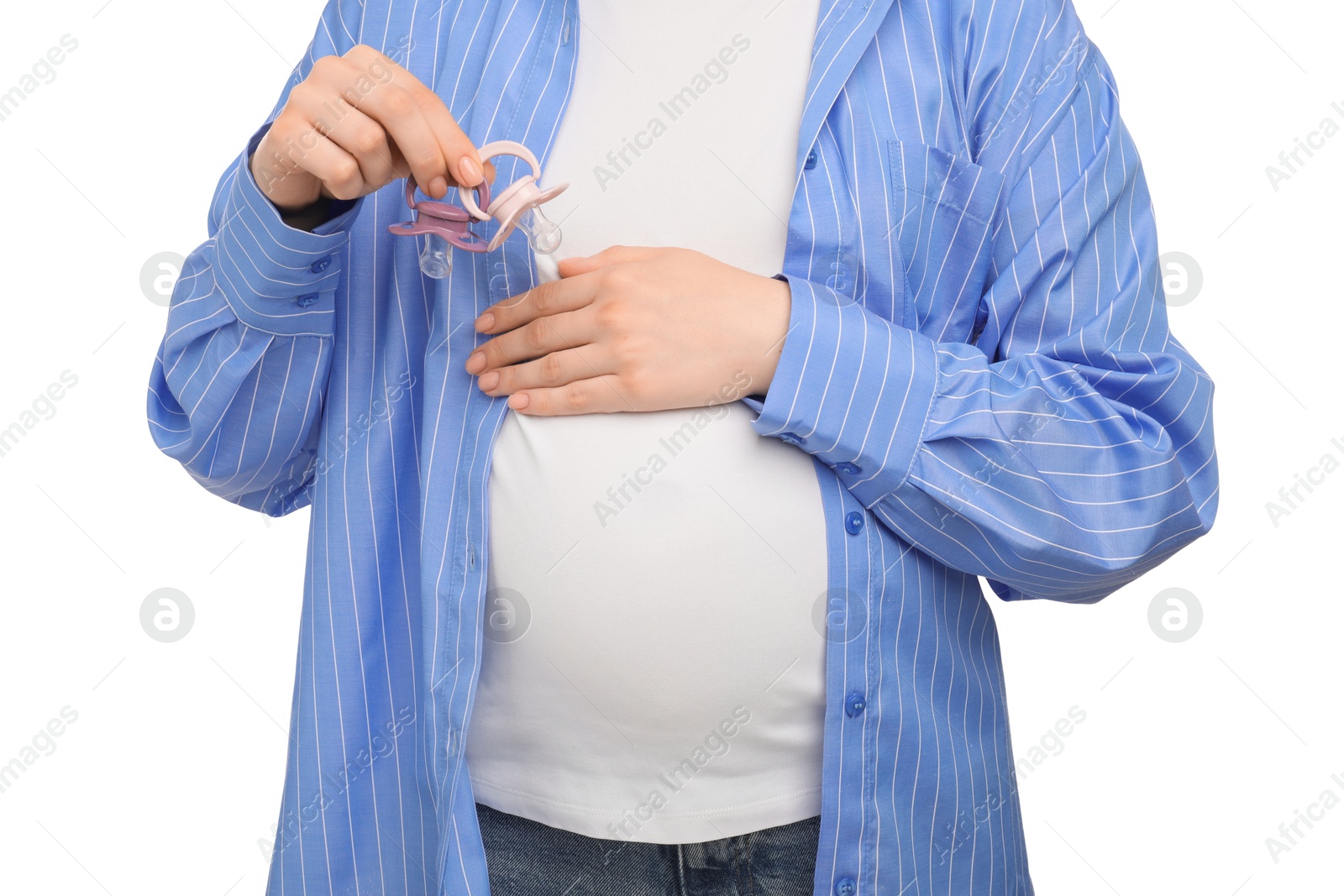 Photo of Expecting twins. Pregnant woman holding two pacifiers on white background, closeup