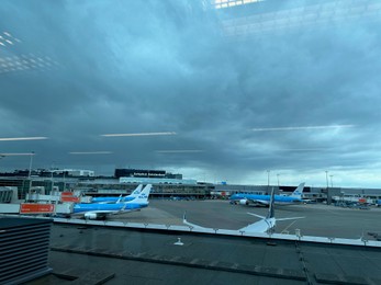 Haarlemmermeer, Netherlands - July 3, 2024: Modern airplanes in Amsterdam Airport Schiphol