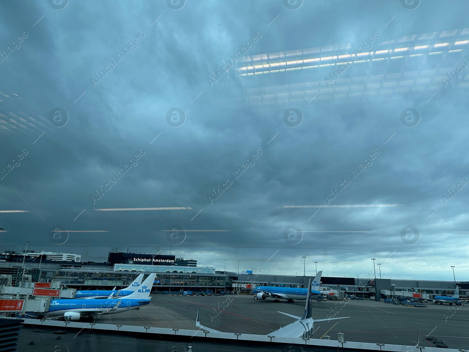 Photo of Haarlemmermeer, Netherlands - July 3, 2024: Modern airplanes in Amsterdam Airport Schiphol