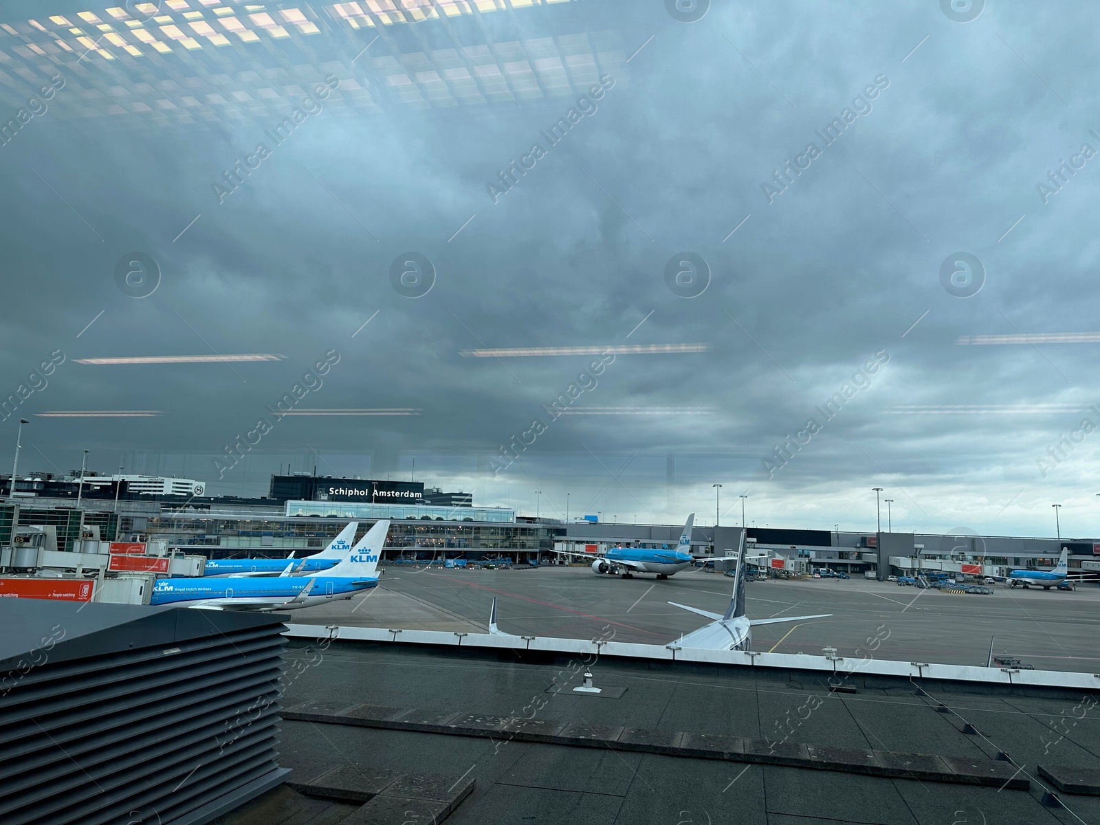 Photo of Haarlemmermeer, Netherlands - July 3, 2024: Modern airplanes in Amsterdam Airport Schiphol