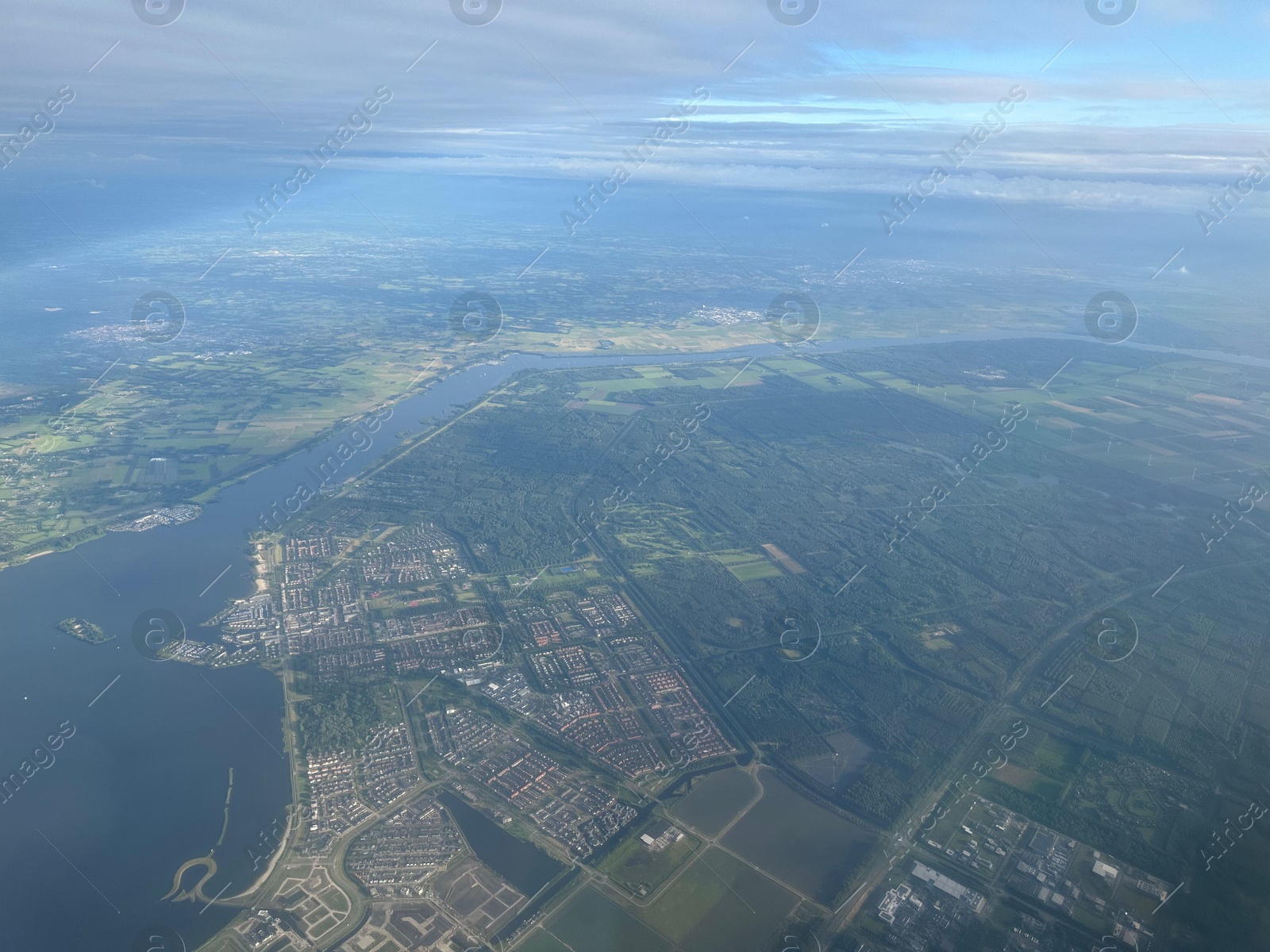 Photo of Picturesque view of city through plane window during flight